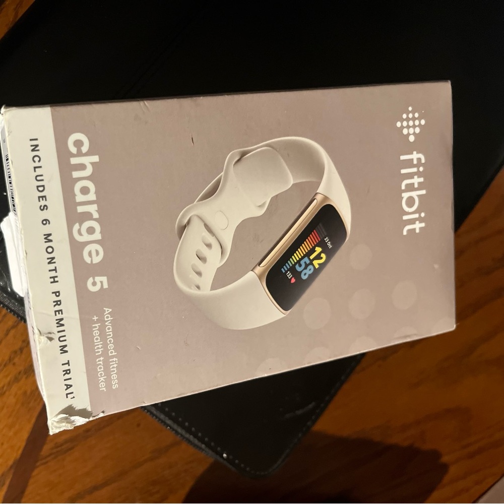 FITBIT CHARGE 5 NIB ROSE GOLD W/ cream band